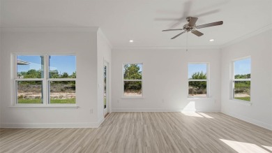 Welcome to the Monroe, a new home floor plan located at on Bay Point Resort Golf Club in Florida - for sale on GolfHomes.com, golf home, golf lot