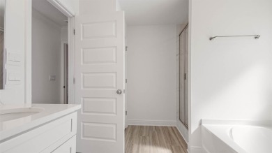 Welcome to the Monroe, a new home floor plan located at on Bay Point Resort Golf Club in Florida - for sale on GolfHomes.com, golf home, golf lot
