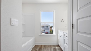Welcome to the Norfolk, a new home floor plan at Sanctuary Beach on Bay Point Resort Golf Club in Florida - for sale on GolfHomes.com, golf home, golf lot