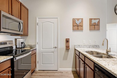 Desirable top floor mountain getaway in Aspen Meadows with full on Headwaters Golf Course At Granby Ranch in Colorado - for sale on GolfHomes.com, golf home, golf lot