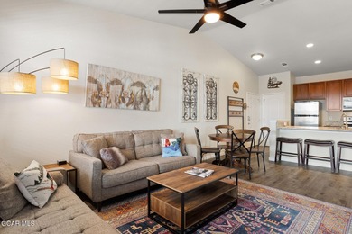 Desirable top floor mountain getaway in Aspen Meadows with full on Headwaters Golf Course At Granby Ranch in Colorado - for sale on GolfHomes.com, golf home, golf lot