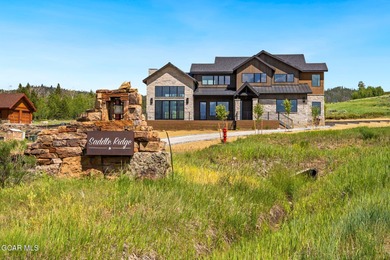 Situated amongst the serene grandeur of Granby Ranch, this on Headwaters Golf Course At Granby Ranch in Colorado - for sale on GolfHomes.com, golf home, golf lot