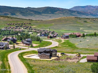 Situated amongst the serene grandeur of Granby Ranch, this on Headwaters Golf Course At Granby Ranch in Colorado - for sale on GolfHomes.com, golf home, golf lot