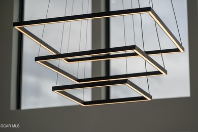 Situated amongst the serene grandeur of Granby Ranch, this on Headwaters Golf Course At Granby Ranch in Colorado - for sale on GolfHomes.com, golf home, golf lot