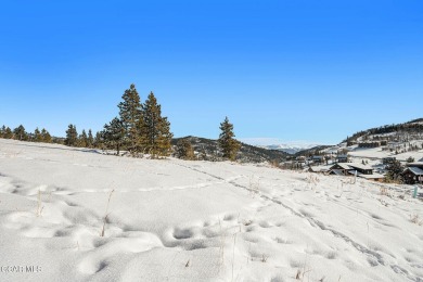 Great 1/3 acre lot with views down the valley and towards Winter on Headwaters Golf Course At Granby Ranch in Colorado - for sale on GolfHomes.com, golf home, golf lot