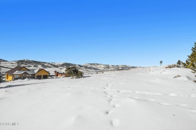 Great 1/3 acre lot with views down the valley and towards Winter on Headwaters Golf Course At Granby Ranch in Colorado - for sale on GolfHomes.com, golf home, golf lot