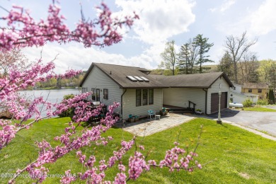 Enjoy this stunning Lake Winola property with incredible views on Scranton Canoe Club in Pennsylvania - for sale on GolfHomes.com, golf home, golf lot