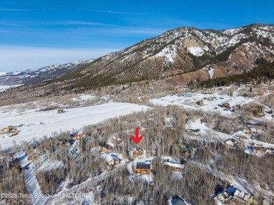 Tucked among the aspen and pines in Star Valley Ranch, this on Star Valley RV Golf Course in Wyoming - for sale on GolfHomes.com, golf home, golf lot