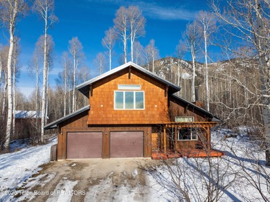 Tucked among the aspen and pines in Star Valley Ranch, this on Star Valley RV Golf Course in Wyoming - for sale on GolfHomes.com, golf home, golf lot