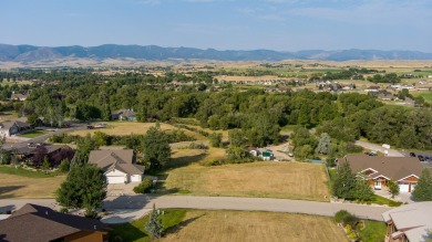 Picture yourself, on your back patio, enjoying the picturesque on The Powder Horn Golf Club - Mountain in Wyoming - for sale on GolfHomes.com, golf home, golf lot