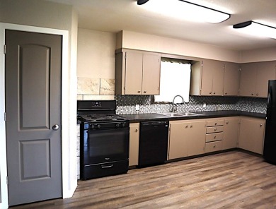 Updated 3 bedroom, 1 bathroom home only blocks from a golf on Sweetwater Country Club in Texas - for sale on GolfHomes.com, golf home, golf lot