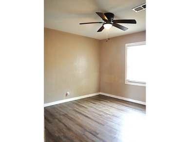 Updated 3 bedroom, 1 bathroom home only blocks from a golf on Sweetwater Country Club in Texas - for sale on GolfHomes.com, golf home, golf lot