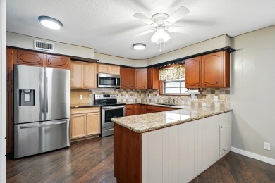 Step into this beautifully renovated home, just around the on Sweetwater Country Club in Texas - for sale on GolfHomes.com, golf home, golf lot