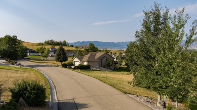 Picture yourself, on your back patio, enjoying the picturesque on The Powder Horn Golf Club - Mountain in Wyoming - for sale on GolfHomes.com, golf home, golf lot