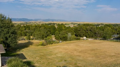 Picture yourself, on your back patio, enjoying the picturesque on The Powder Horn Golf Club - Mountain in Wyoming - for sale on GolfHomes.com, golf home, golf lot