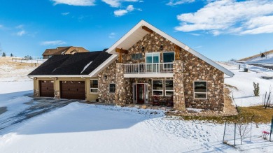 This stunning 4-Bedroom, 2.5 Bath home w/over 2,500 sq ft of on The Powder Horn Golf Club - Mountain in Wyoming - for sale on GolfHomes.com, golf home, golf lot