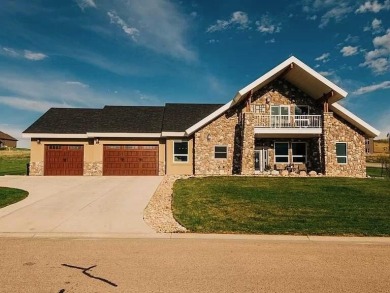 This stunning 4-Bedroom, 2.5 Bath home w/over 2,500 sq ft of on The Powder Horn Golf Club - Mountain in Wyoming - for sale on GolfHomes.com, golf home, golf lot