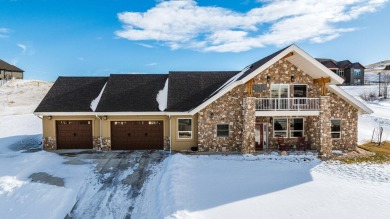 This stunning 4-Bedroom, 2.5 Bath home w/over 2,500 sq ft of on The Powder Horn Golf Club - Mountain in Wyoming - for sale on GolfHomes.com, golf home, golf lot