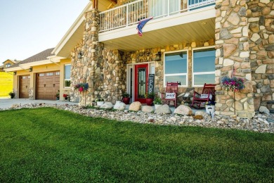 This stunning 4-Bedroom, 2.5 Bath home w/over 2,500 sq ft of on The Powder Horn Golf Club - Mountain in Wyoming - for sale on GolfHomes.com, golf home, golf lot