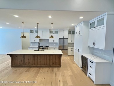 Refined Elegance Joins Nature's Doorstep. Set within one of the on Teton Reserve in Idaho - for sale on GolfHomes.com, golf home, golf lot