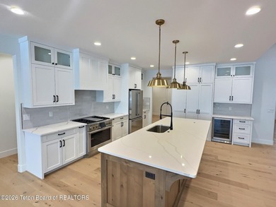 Refined Elegance Joins Nature's Doorstep. Set within one of the on Teton Reserve in Idaho - for sale on GolfHomes.com, golf home, golf lot