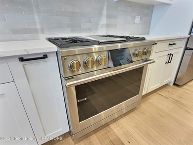 Refined Elegance Joins Nature's Doorstep. Set within one of the on Teton Reserve in Idaho - for sale on GolfHomes.com, golf home, golf lot