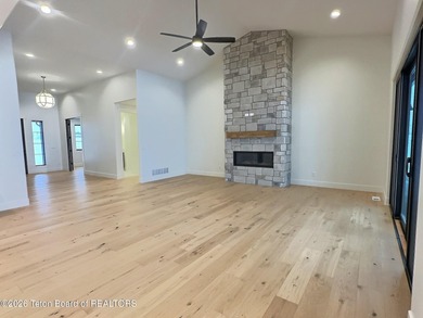 Refined Elegance Joins Nature's Doorstep. Set within one of the on Teton Reserve in Idaho - for sale on GolfHomes.com, golf home, golf lot