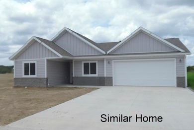 Brand new construction, fully landscaped. Located in Hidden on Hidden Bridge Golf Club in Wyoming - for sale on GolfHomes.com, golf home, golf lot