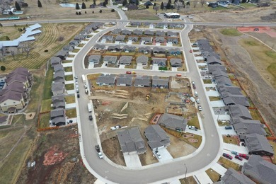 Brand new construction, fully landscaped. Located in Hidden on Hidden Bridge Golf Club in Wyoming - for sale on GolfHomes.com, golf home, golf lot