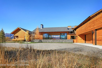 Perfectly positioned on one of the most breathtaking vantage on Jackson Hole Golf and Tennis Club in Wyoming - for sale on GolfHomes.com, golf home, golf lot