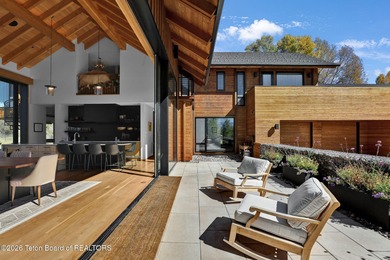 Perfectly positioned on one of the most breathtaking vantage on Jackson Hole Golf and Tennis Club in Wyoming - for sale on GolfHomes.com, golf home, golf lot