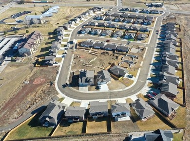 Brand new construction: completion May 2026, fully landscaped on Hidden Bridge Golf Club in Wyoming - for sale on GolfHomes.com, golf home, golf lot