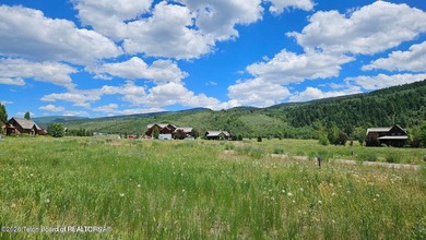 Beautiful custom home site overlooking Hole 7 of the Hale Irwin on Teton Reserve in Idaho - for sale on GolfHomes.com, golf home, golf lot