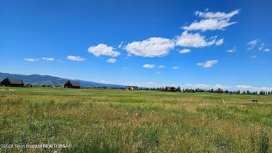 Beautiful custom home site overlooking Hole 7 of the Hale Irwin on Teton Reserve in Idaho - for sale on GolfHomes.com, golf home, golf lot