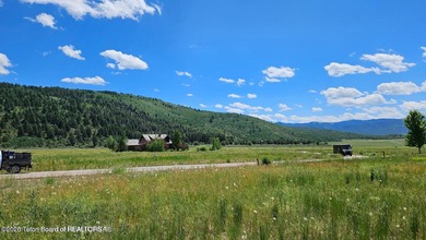 Beautiful custom home site overlooking Hole 7 of the Hale Irwin on Teton Reserve in Idaho - for sale on GolfHomes.com, golf home, golf lot