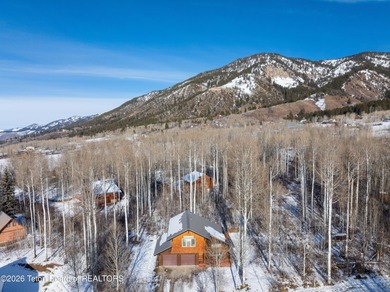 Tucked among the aspen and pines in Star Valley Ranch, this on Star Valley RV Golf Course in Wyoming - for sale on GolfHomes.com, golf home, golf lot