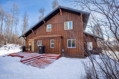 Tucked among the aspen and pines in Star Valley Ranch, this on Star Valley RV Golf Course in Wyoming - for sale on GolfHomes.com, golf home, golf lot