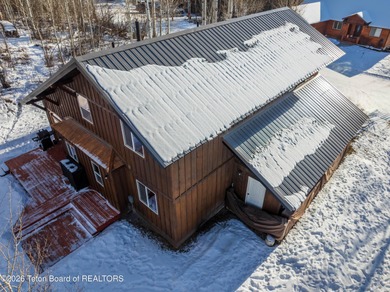 Tucked among the aspen and pines in Star Valley Ranch, this on Star Valley RV Golf Course in Wyoming - for sale on GolfHomes.com, golf home, golf lot
