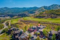 Experience mountain elegance in this luxurious three-bedroom for sale in Park City Utah Summit County County on GolfHomes.com