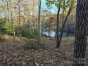 Here's your chance to own a lakefront lot along Shumont Lake for sale in Lake Lure North Carolina Rutherford County County on GolfHomes.com