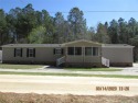 Home located in White Lake area.  Three bedrooms, 2 baths for sale in Elizabethtown North Carolina Bladen County County on GolfHomes.com