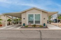 Welcome home! Check out this charming single-level manufactured for sale in El Mirage Arizona Maricopa County County on GolfHomes.com