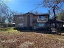 Check out this spacious house that sits across the road from for sale in Hilltop Lakes Texas Leon County County on GolfHomes.com