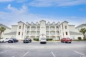 Unit 304 is a beautiful, 2 bedroom/2 bath, top floor condo with for sale in Myrtle Beach South Carolina Horry County County on GolfHomes.com
