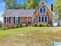 Nestled on a peaceful street in Woodland Hills, this charming for sale in Bessemer Alabama Jefferson County County on GolfHomes.com