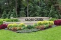 Tucked inside the serene and sought-after Cross Creek community for sale in Atlanta Georgia Fulton County County on GolfHomes.com