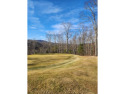 This ideal large golf course lot wraps around the 11th green of for sale in Cullowhee North Carolina Jackson County County on GolfHomes.com