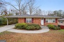 Charming brick ranch on a basement, perfectly positioned in a for sale in Atlanta Georgia Fulton County County on GolfHomes.com