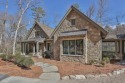 Welcome to this newly constructed stone, English-style cottage for sale in Cashiers North Carolina Jackson County County on GolfHomes.com