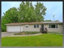 SET FOR LIVING with over 1.5 Acres located in desirable location for sale in Cottage Grove Wisconsin Dane County County on GolfHomes.com